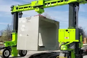 Manutention de bloc béton avec la fonction télescopique