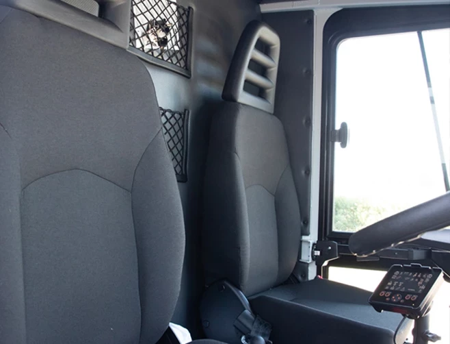 Une cabine confortable, ergonomique et qui protège le conducteur